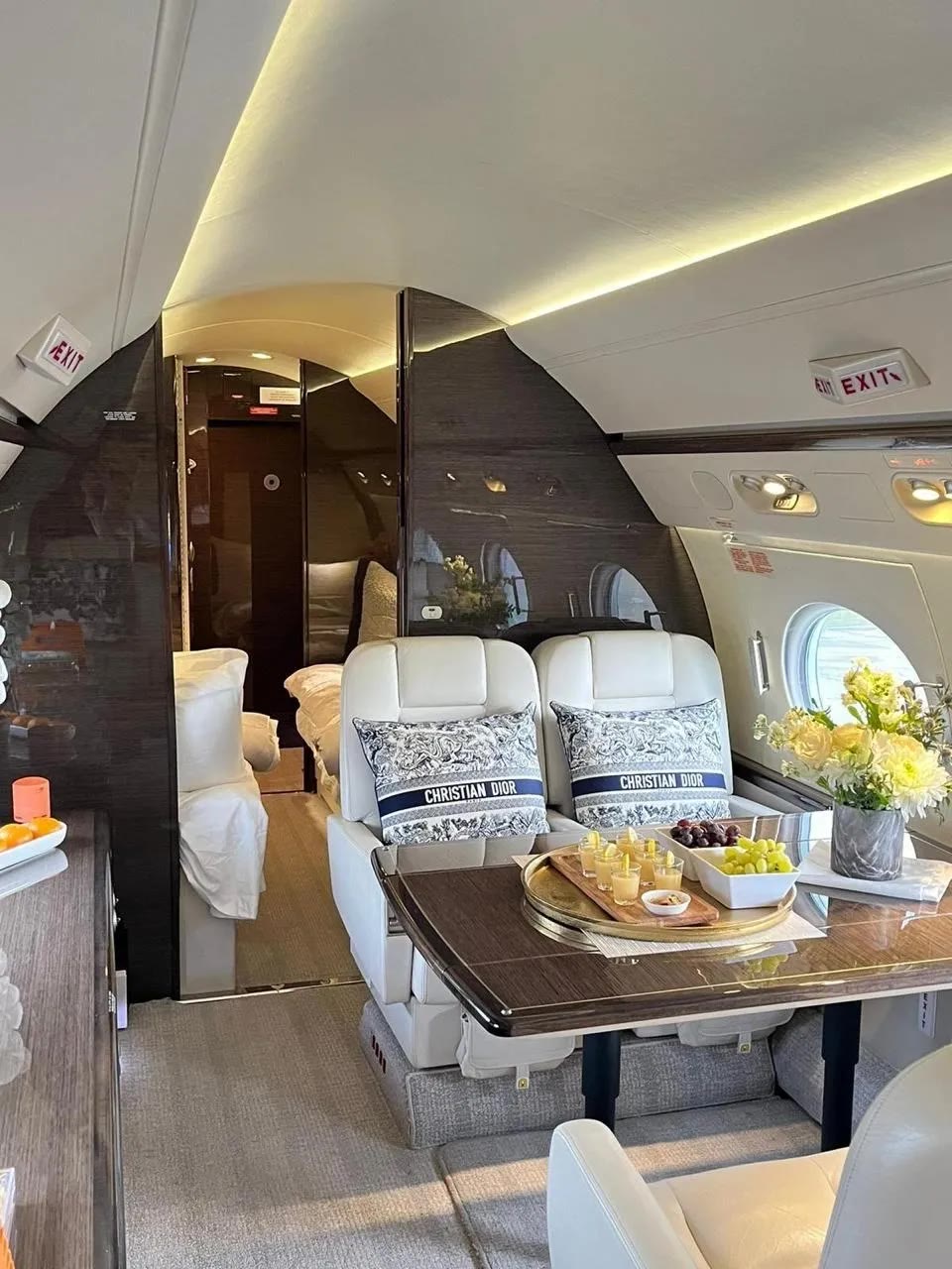 Private cabin styled with Christian Dior, set for dining